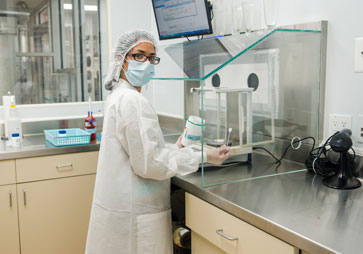 Pharmacy worker in mask - USP 800 Compounding Pharmacy