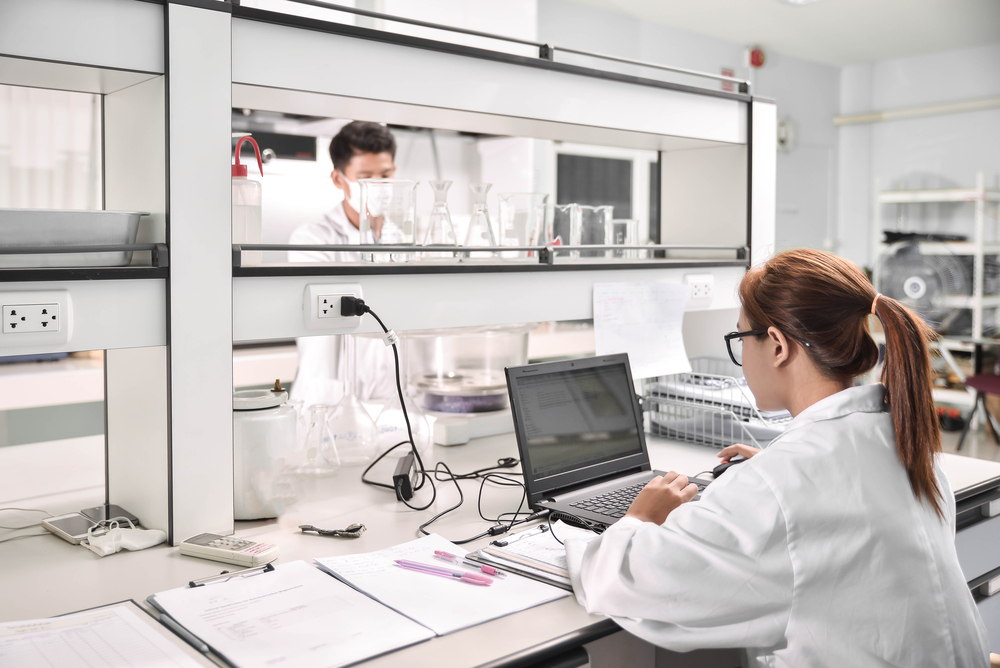 Young laboratory assistant working prepare instrument for chemical lab experiment in Lab