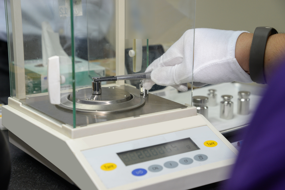 weight measure on the electronic balance in a laboratory for calibration